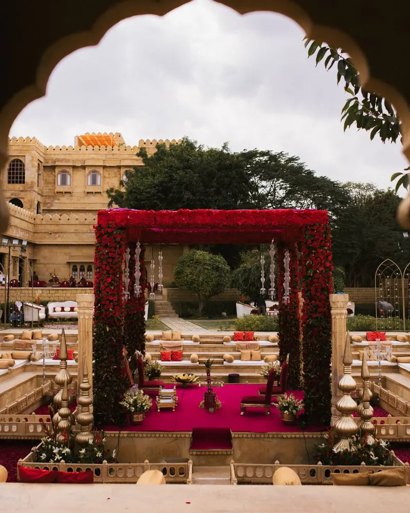Flower-decorated mandap at an Indian wedding venue